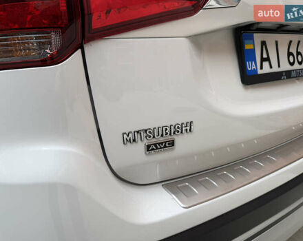 Белый Мицубиси Аутлендер, объемом двигателя 2.36 л и пробегом 47 тыс. км за 18800 $, фото 15 на Automoto.ua