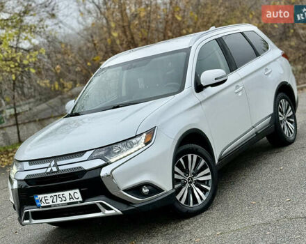 Білий Міцубісі Аутлендер, об'ємом двигуна 2.4 л та пробігом 190 тис. км за 14500 $, фото 1 на Automoto.ua