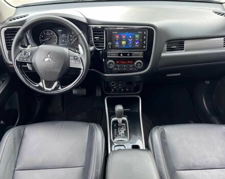 Белый Мицубиси Аутлендер, объемом двигателя 3 л и пробегом 46 тыс. км за 10900 $, фото 7 на Automoto.ua