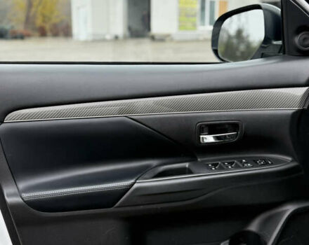 Білий Міцубісі Аутлендер, об'ємом двигуна 2.4 л та пробігом 190 тис. км за 14500 $, фото 18 на Automoto.ua