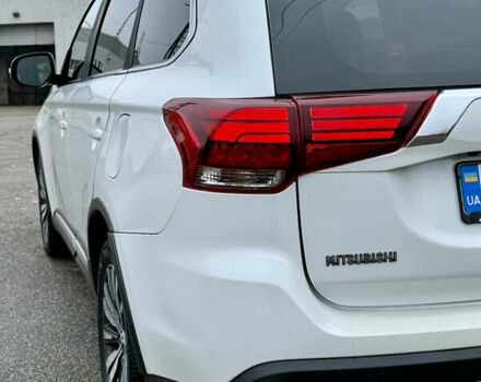 Білий Міцубісі Аутлендер, об'ємом двигуна 2.4 л та пробігом 190 тис. км за 14500 $, фото 12 на Automoto.ua