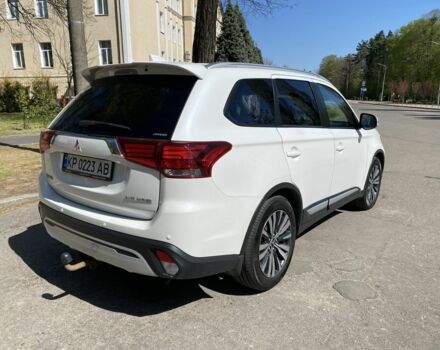 Білий Міцубісі Аутлендер, об'ємом двигуна 2.4 л та пробігом 147 тис. км за 21000 $, фото 1 на Automoto.ua