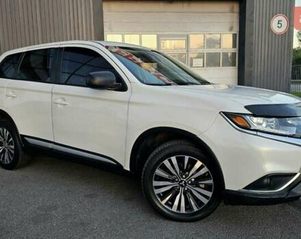 Білий Міцубісі Аутлендер, об'ємом двигуна 2.4 л та пробігом 98 тис. км за 19600 $, фото 3 на Automoto.ua