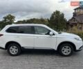 Білий Міцубісі Аутлендер, об'ємом двигуна 2.36 л та пробігом 82 тис. км за 15999 $, фото 2 на Automoto.ua