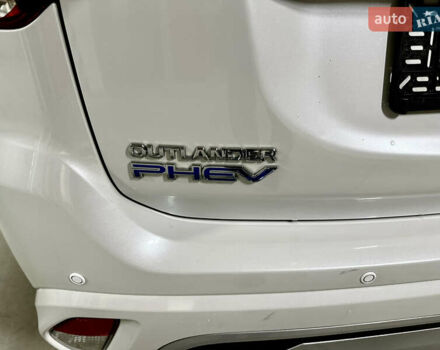 Белый Мицубиси Аутлендер, объемом двигателя 2 л и пробегом 70 тыс. км за 24300 $, фото 41 на Automoto.ua