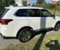 Белый Мицубиси Аутлендер, объемом двигателя 2.36 л и пробегом 160 тыс. км за 17400 $, фото 4 на Automoto.ua