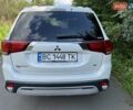 Белый Мицубиси Аутлендер, объемом двигателя 2.36 л и пробегом 160 тыс. км за 17400 $, фото 9 на Automoto.ua