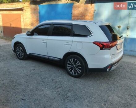 Белый Мицубиси Аутлендер, объемом двигателя 2.36 л и пробегом 98 тыс. км за 20500 $, фото 10 на Automoto.ua