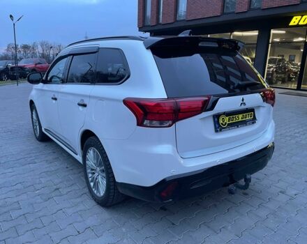 Белый Мицубиси Аутлендер, объемом двигателя 2.4 л и пробегом 53 тыс. км за 32900 $, фото 3 на Automoto.ua