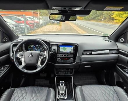 Белый Мицубиси Аутлендер, объемом двигателя 2.4 л и пробегом 42 тыс. км за 6000 $, фото 9 на Automoto.ua