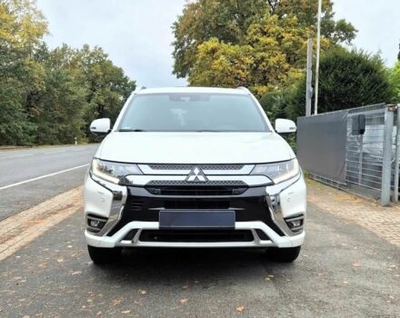 Белый Мицубиси Аутлендер, объемом двигателя 2.4 л и пробегом 42 тыс. км за 6000 $, фото 1 на Automoto.ua