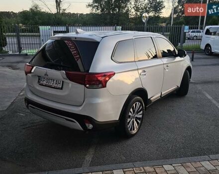 Білий Міцубісі Аутлендер, об'ємом двигуна 2.4 л та пробігом 98 тис. км за 19600 $, фото 10 на Automoto.ua