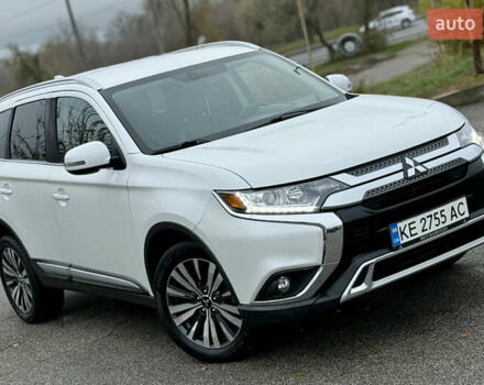 Білий Міцубісі Аутлендер, об'ємом двигуна 2.4 л та пробігом 190 тис. км за 14500 $, фото 4 на Automoto.ua