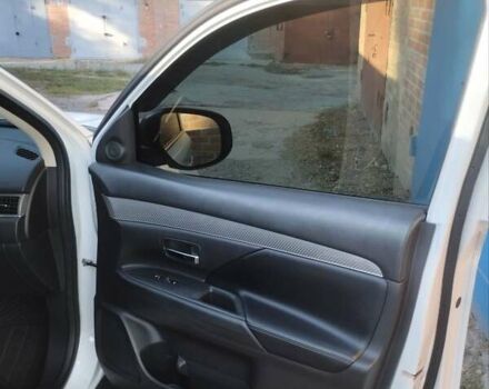 Белый Мицубиси Аутлендер, объемом двигателя 2.36 л и пробегом 98 тыс. км за 20500 $, фото 23 на Automoto.ua