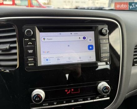 Білий Міцубісі Аутлендер, об'ємом двигуна 2 л та пробігом 19 тис. км за 17700 $, фото 34 на Automoto.ua