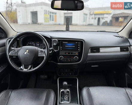 Білий Міцубісі Аутлендер, об'ємом двигуна 2.4 л та пробігом 190 тис. км за 14500 $, фото 17 на Automoto.ua