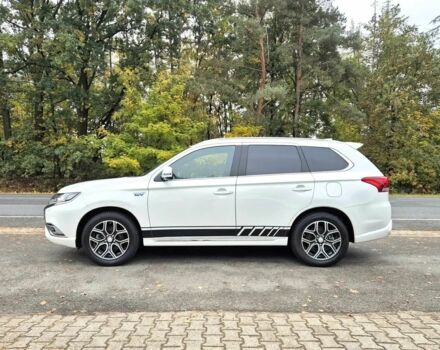 Белый Мицубиси Аутлендер, объемом двигателя 2.4 л и пробегом 42 тыс. км за 6000 $, фото 3 на Automoto.ua