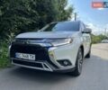 Белый Мицубиси Аутлендер, объемом двигателя 2.36 л и пробегом 160 тыс. км за 17400 $, фото 5 на Automoto.ua