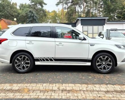 Белый Мицубиси Аутлендер, объемом двигателя 2.4 л и пробегом 42 тыс. км за 6000 $, фото 5 на Automoto.ua