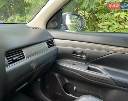 Белый Мицубиси Аутлендер, объемом двигателя 2.36 л и пробегом 160 тыс. км за 17400 $, фото 11 на Automoto.ua