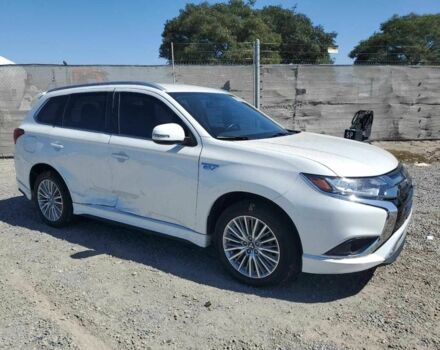 Белый Мицубиси Аутлендер, объемом двигателя 2 л и пробегом 54 тыс. км за 4200 $, фото 3 на Automoto.ua