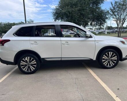 Белый Мицубиси Аутлендер, объемом двигателя 3 л и пробегом 46 тыс. км за 10900 $, фото 5 на Automoto.ua