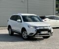 Белый Мицубиси Аутлендер, объемом двигателя 2.4 л и пробегом 123 тыс. км за 14900 $, фото 1 на Automoto.ua