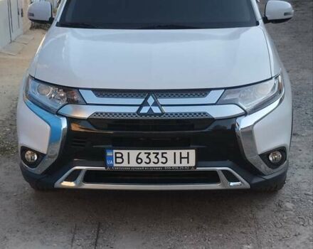 Белый Мицубиси Аутлендер, объемом двигателя 2.36 л и пробегом 98 тыс. км за 20500 $, фото 8 на Automoto.ua