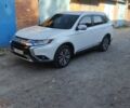 Белый Мицубиси Аутлендер, объемом двигателя 2.36 л и пробегом 98 тыс. км за 20500 $, фото 1 на Automoto.ua