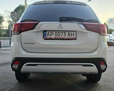 Білий Міцубісі Аутлендер, об'ємом двигуна 2.4 л та пробігом 98 тис. км за 19600 $, фото 7 на Automoto.ua