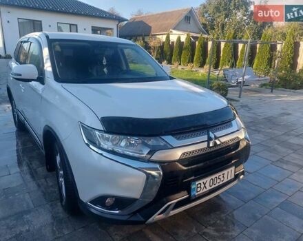 Белый Мицубиси Аутлендер, объемом двигателя 2 л и пробегом 108 тыс. км за 19000 $, фото 1 на Automoto.ua