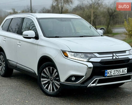 Білий Міцубісі Аутлендер, об'ємом двигуна 2.4 л та пробігом 190 тис. км за 14500 $, фото 3 на Automoto.ua