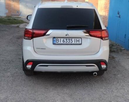 Белый Мицубиси Аутлендер, объемом двигателя 2.36 л и пробегом 98 тыс. км за 20500 $, фото 14 на Automoto.ua