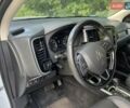 Белый Мицубиси Аутлендер, объемом двигателя 2.36 л и пробегом 160 тыс. км за 17400 $, фото 13 на Automoto.ua