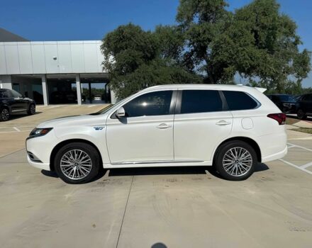 Белый Мицубиси Аутлендер, объемом двигателя 2 л и пробегом 32 тыс. км за 4400 $, фото 3 на Automoto.ua