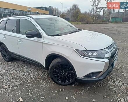 Білий Міцубісі Аутлендер, об'ємом двигуна 2.36 л та пробігом 170 тис. км за 18200 $, фото 3 на Automoto.ua