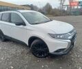 Білий Міцубісі Аутлендер, об'ємом двигуна 2.36 л та пробігом 170 тис. км за 18200 $, фото 3 на Automoto.ua