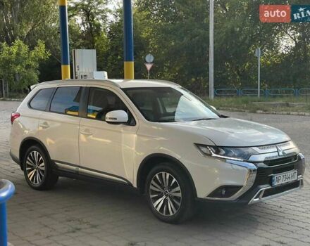 Белый Мицубиси Аутлендер, объемом двигателя 2.36 л и пробегом 57 тыс. км за 23800 $, фото 12 на Automoto.ua