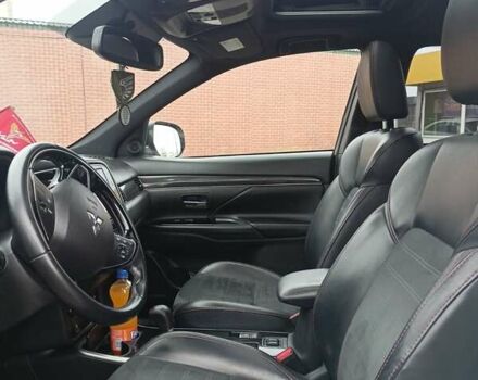 Білий Міцубісі Аутлендер, об'ємом двигуна 2.36 л та пробігом 170 тис. км за 18200 $, фото 11 на Automoto.ua