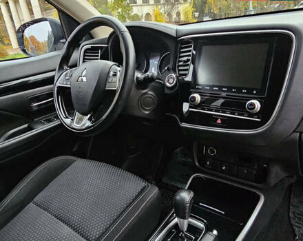 Білий Міцубісі Аутлендер, об'ємом двигуна 2 л та пробігом 74 тис. км за 16500 $, фото 12 на Automoto.ua