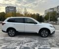 Білий Міцубісі Аутлендер, об'ємом двигуна 2.4 л та пробігом 70 тис. км за 17500 $, фото 1 на Automoto.ua