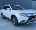 Белый Мицубиси Аутлендер, объемом двигателя 2.4 л и пробегом 120 тыс. км за 18990 $, фото 2 на Automoto.ua