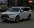 Белый Мицубиси Аутлендер, объемом двигателя 2 л и пробегом 153 тыс. км за 22990 $, фото 1 на Automoto.ua