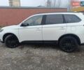 Білий Міцубісі Аутлендер, об'ємом двигуна 2.36 л та пробігом 170 тис. км за 18200 $, фото 4 на Automoto.ua