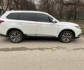 Білий Міцубісі Аутлендер, об'ємом двигуна 2.4 л та пробігом 70 тис. км за 21000 $, фото 2 на Automoto.ua