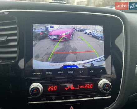 Белый Мицубиси Аутлендер, объемом двигателя 2.36 л и пробегом 59 тыс. км за 25000 $, фото 24 на Automoto.ua