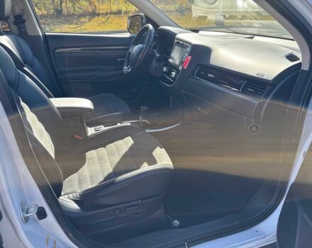 Белый Мицубиси Аутлендер, объемом двигателя 2.4 л и пробегом 44 тыс. км за 5800 $, фото 11 на Automoto.ua