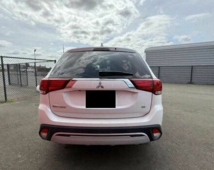 Белый Мицубиси Аутлендер, объемом двигателя 2.4 л и пробегом 65 тыс. км за 9500 $, фото 3 на Automoto.ua