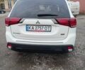 Білий Міцубісі Аутлендер, об'ємом двигуна 2.36 л та пробігом 170 тис. км за 18200 $, фото 1 на Automoto.ua