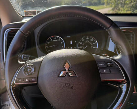 Білий Міцубісі Аутлендер, об'ємом двигуна 2.36 л та пробігом 111 тис. км за 19300 $, фото 18 на Automoto.ua